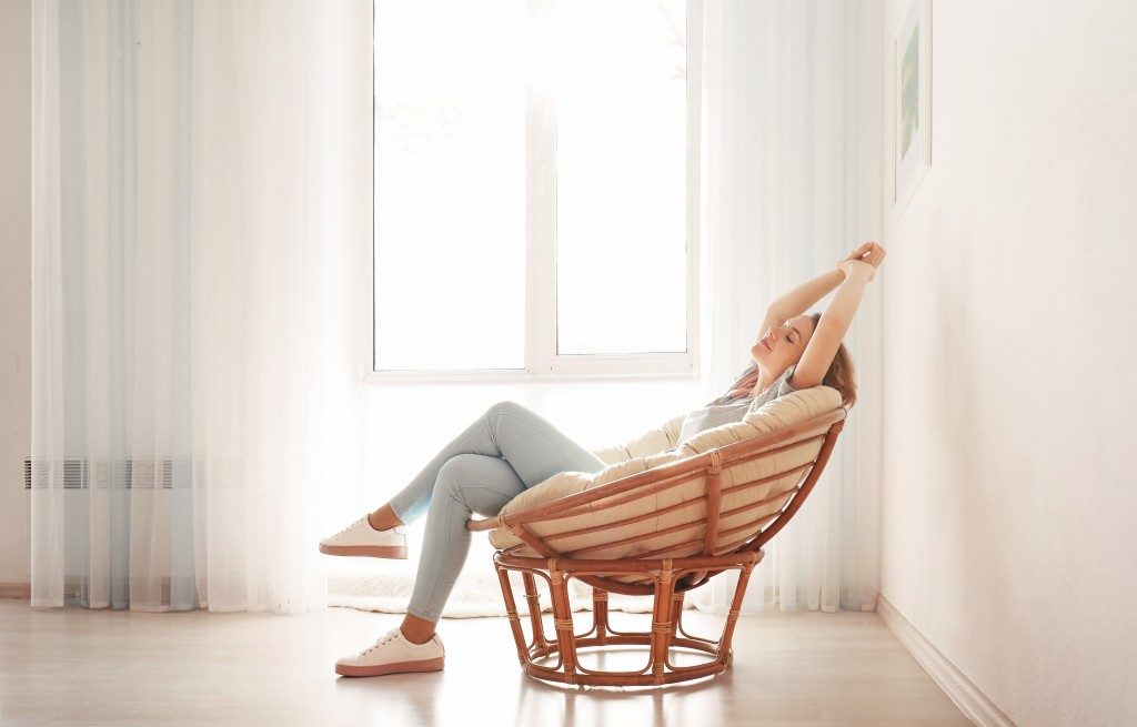 woman relaxing in her home