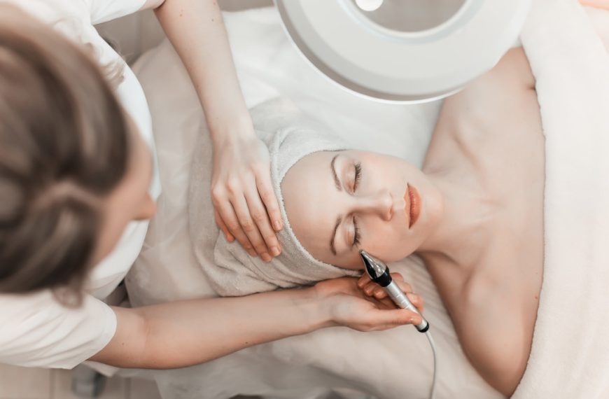 woman getting a beauty procedure from a female aethetician for improving looks